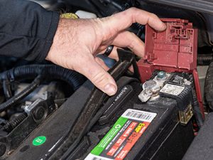 Checking the battery terminals for corrosion and loose connections.